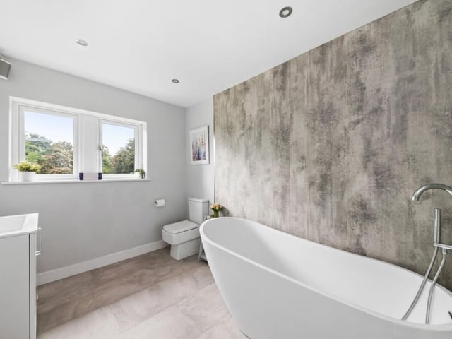 The bath section of the house bathroom.