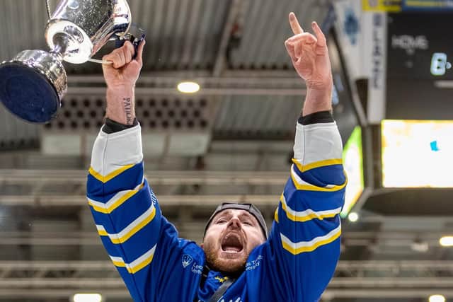 TROPHY RUN: Liam Peyton celebrates on the Skydome Arena ice on Sunday night with the NIHL National play-off trophy. Picture: Miles Tidman/Knights Media
