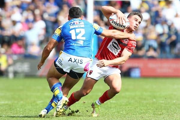 Salford play-maker Brodie Croft, pictured being tackled by Leeds' Rhyse Martin, is the reigning Man of Steel. Picture by Matt West/SWpix.com.
