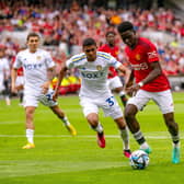 SOLID RETURN: Leeds United defender Cody Drameh, centre, challenges Manchester United's Omari Forson during Wednesday's pre-season friendly in Oslo. 
Photo by Ash Donelon/Manchester United via Getty Images.