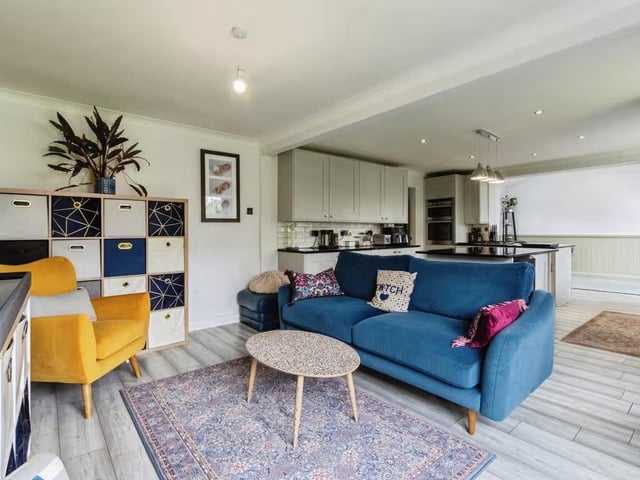 At the heart of the home is an impressive open plan kitchen, dining and family room.