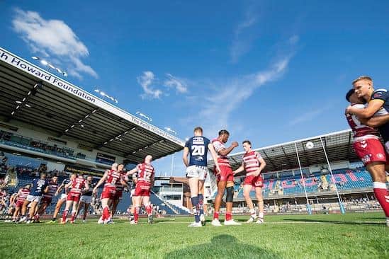 Leeds and Wigan players shake hands after last Saturday's match. Picture by Allan McKenzie/SWpix.com.