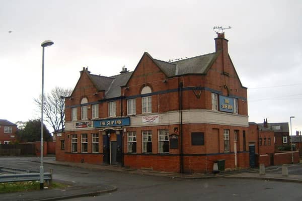 The Slip Inn, previously known as the New Regent Hotel, at the junction of Temple View Road and Temple View Grove in Richmond Hill. It closed around 2010, and the building now houses a supermarket and Post Office. To the right can be seen the houses on Glendale Mount, and to the left, those on East Park View