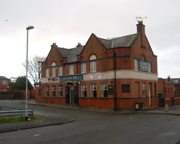 The Slip Inn, previously known as the New Regent Hotel, at the junction of Temple View Road and Temple View Grove in Richmond Hill. It closed around 2010, and the building now houses a supermarket and Post Office. To the right can be seen the houses on Glendale Mount, and to the left, those on East Park View