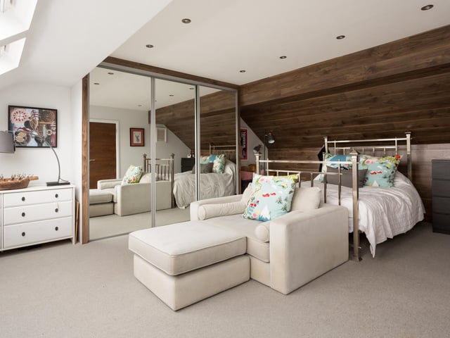 Another of the stylish bedrooms, with built-in wardrobes.