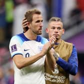 UPBEAT MESSAGE: From former Leeds United star Kalvin Phillips, right, pictured consoling England captain Harry Kane after Saturday night's 2-1 defeat to France in the Qatar World Cup quarter-finals. Photo by Richard Heathcote/Getty Images.