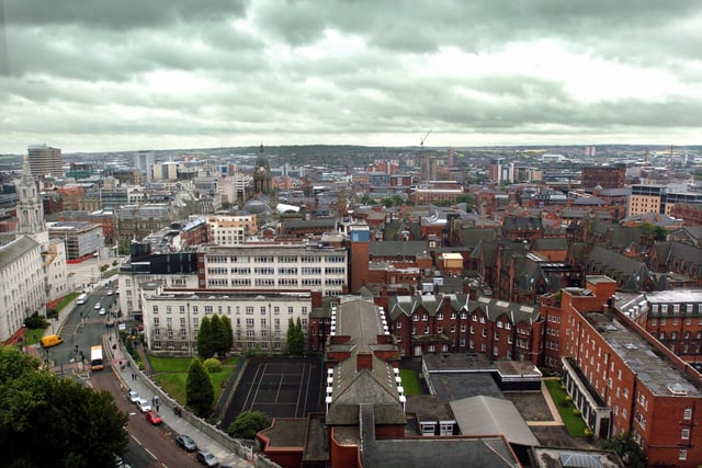 Leeds city centre viewed from the 10th floor of Leeds Metropolitan University in July 2004.  In focus  is Calverley Street and Leeds Civic Hall to the left, Leeds General Infirmary and Leeds Town Hall.
