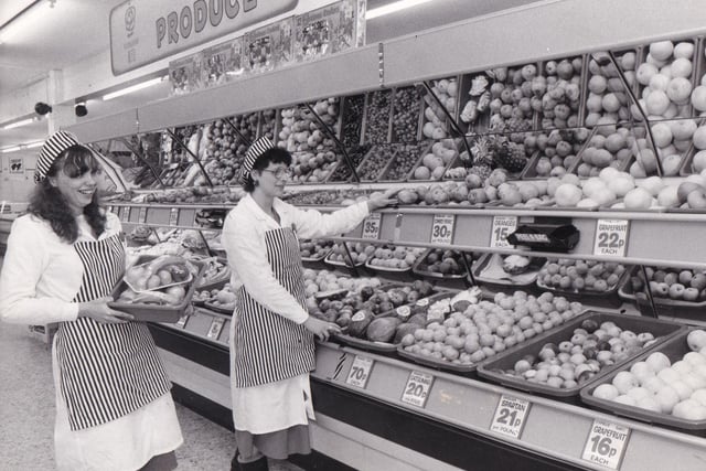 Coconuts 40p each, grapefruit 16p each, oranges 16p each, bramleys 20p per pound. The produce department at the Co-op store on York Road pictured in December 1984.