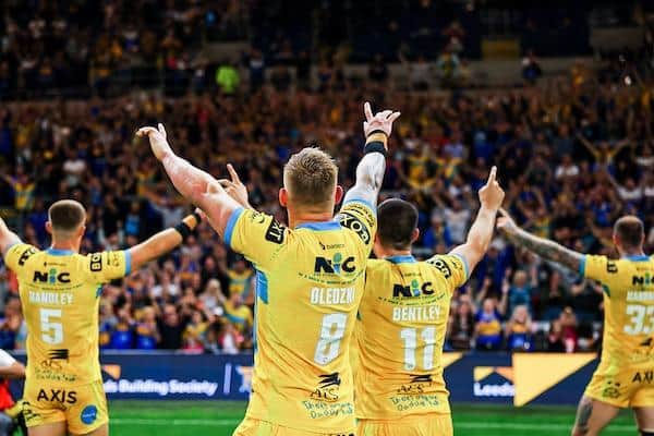 Rhinos celebrate their 18-14 win over Giants. Picture by Alex Whitehead/SWpix.com.