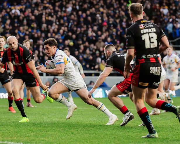 Brodie Croft races over for a try in Leeds Rhinos' 26-22 win against Warrington Wolves. Picture by Alex Whitehead/SWpix.com.