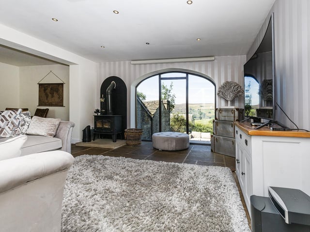 Arched windows showcase the scenery outside.