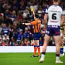 Referee Liam Moore shows a yellow card to Wakefield Trinity's Corey Hall during the Super League Grand Final. Picture by Olly Hassell/SWpix.com.