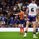 Referee Liam Moore shows a yellow card to Wakefield Trinity's Corey Hall during the Super League Grand Final. Picture by Olly Hassell/SWpix.com.