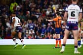 Referee Liam Moore shows a yellow card to Wakefield Trinity's Corey Hall during the Super League Grand Final. Picture by Olly Hassell/SWpix.com.
