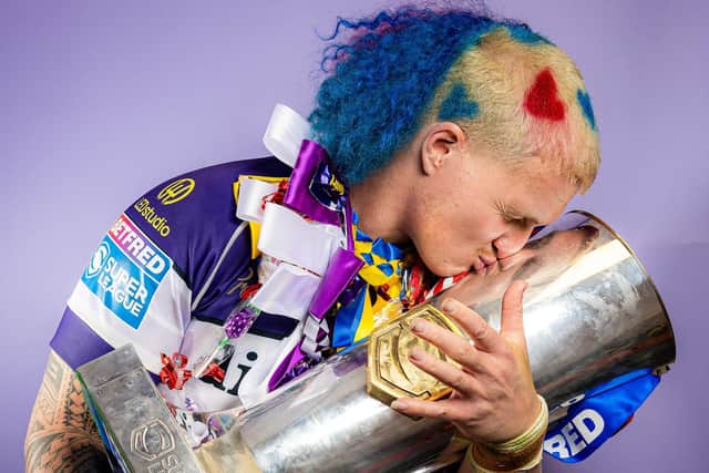 Wakefield Trinity's Caius Faatili with the Betfred Super League trophy. Picture by Alex Whitehead/SWpix.com.