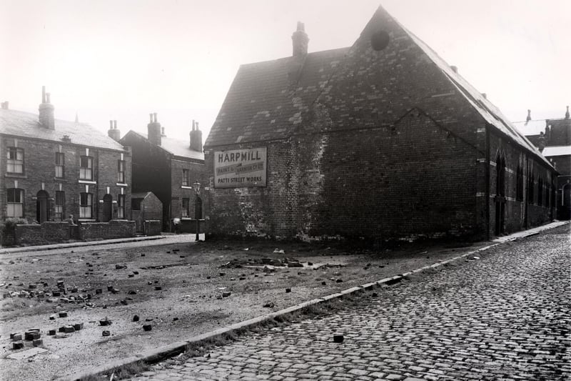 This is looking from Alboni Street towards Alfred Cross Street in July 1958. Patti Street is on the left, in the centre is an area of cleared ground between the two streets. The large building was previously a Wesleyan Methodist Mission Hall, it is used as a paint and varnish works by a company called Harpmill.