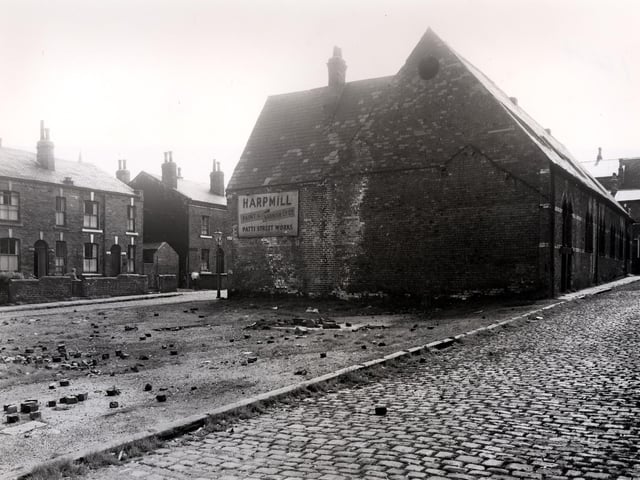 This is looking from Alboni Street towards Alfred Cross Street in July 1958. Patti Street is on the left, in the centre is an area of cleared ground between the two streets. The large building was previously a Wesleyan Methodist Mission Hall, it is used as a paint and varnish works by a company called Harpmill.