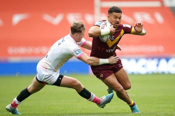 Harry Newman tackles Huddersfield Giants' Esan Marsters. Picture by Ed Sykes/SWpix.com.
