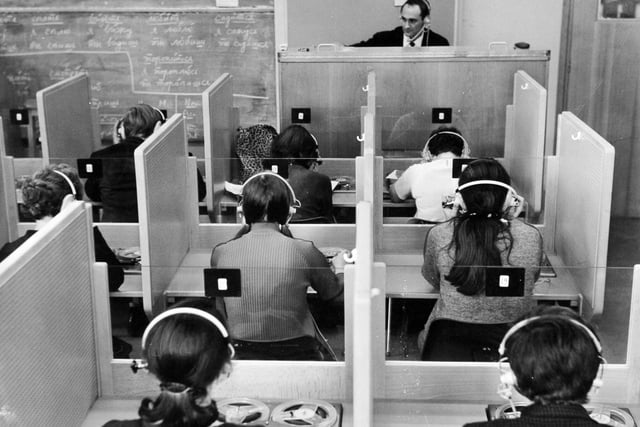 Mr. R. E. Hunt takes a class in the language laboratory at Leeds College of Commerce in February 1969.