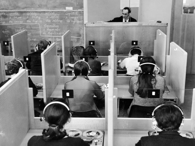 Mr. R. E. Hunt takes a class in the language laboratory at Leeds College of Commerce in February 1969.