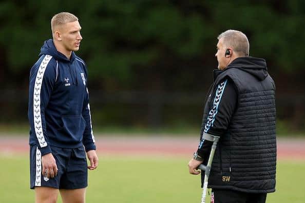 Aidan Sezer hopes England - including Rhinos' Mikolaj Oledzki, pictured talking to coach Shaun Wane - do well in the World Cup. Picture by Paul Currie/SWpix.com.
