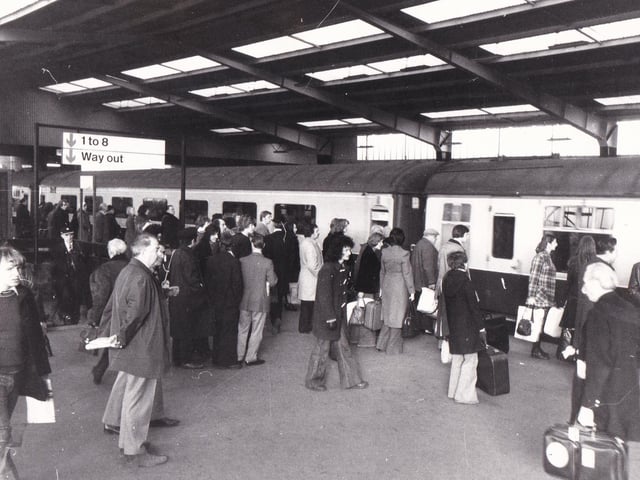Passengers get ready to board the delayed 8.30am Leeds to King's Cross train in March 1976.