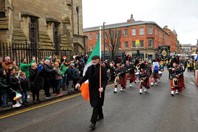 Canon Eugene McGillycuddy, parish priest at St. Patricks in Leeds, leading the parade
