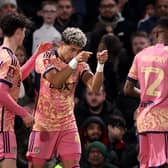 YOUNG STARS: Archie Gray, left, with Mateo Joseph, centre, after Joseph's opening Leeds United goal at Chelsea, set up by winger Jaidon Anthony, right. Photo by Ryan Pierse/Getty Images.