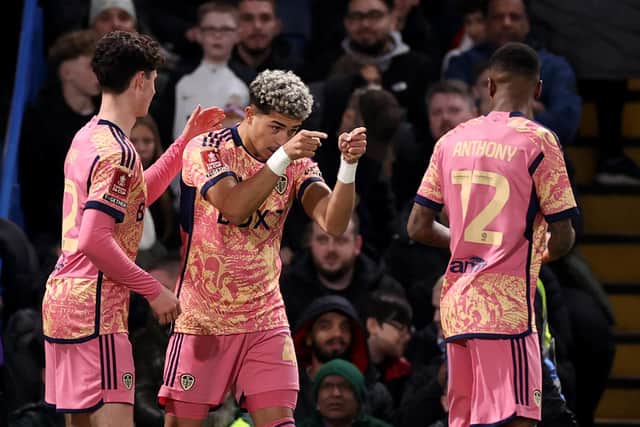 YOUNG STARS: Archie Gray, left, with Mateo Joseph, centre, after Joseph's opening Leeds United goal at Chelsea, set up by winger Jaidon Anthony, right. Photo by Ryan Pierse/Getty Images.