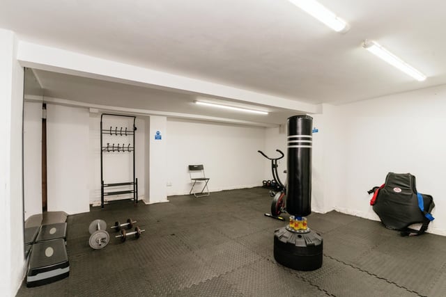 To the basement is a versatile room currently used as a gym and a guest W.C, also useful for storage.