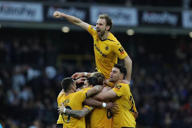 DEMANDS: Set out by defender Craig Dawson, top, of Leeds United's weekend hosts Wolves. Photo by David Rogers/Getty Images.