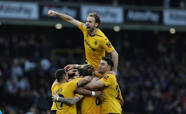 DEMANDS: Set out by defender Craig Dawson, top, of Leeds United's weekend hosts Wolves. Photo by David Rogers/Getty Images.