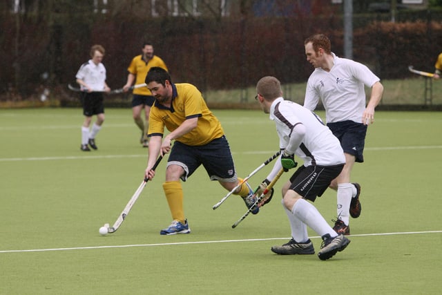 Action from a game between Buxton Hockey Club and Kettering at Buxton Community School.