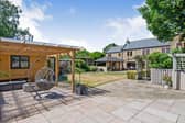 The garden is south facing, with lawn an Indian stone patio, a summer house and added facilities