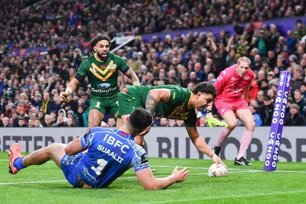 Latrell Mitchell scores the opening try in Australia's World Cup final win over Samoa. Picture by Will Palmer/SWpix.com.