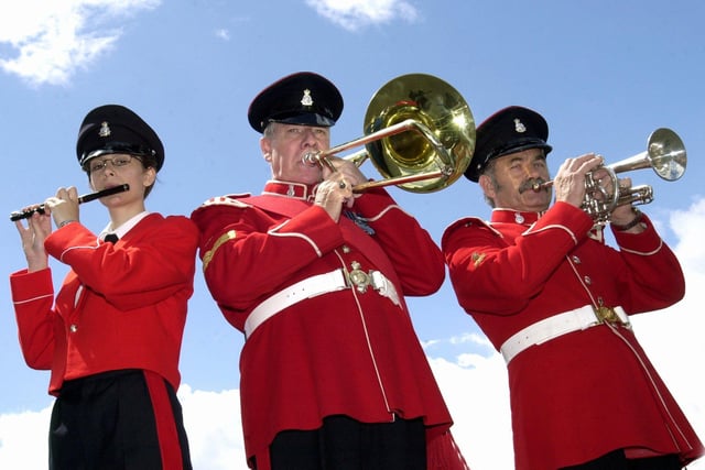 Members of the Yorkshire Volunteers Marching Band prepare for their trip to a military festival in Germany. From left, Claire Stephenson, Allan Millward and Harold Westwood, pictured on July 2, 2002.