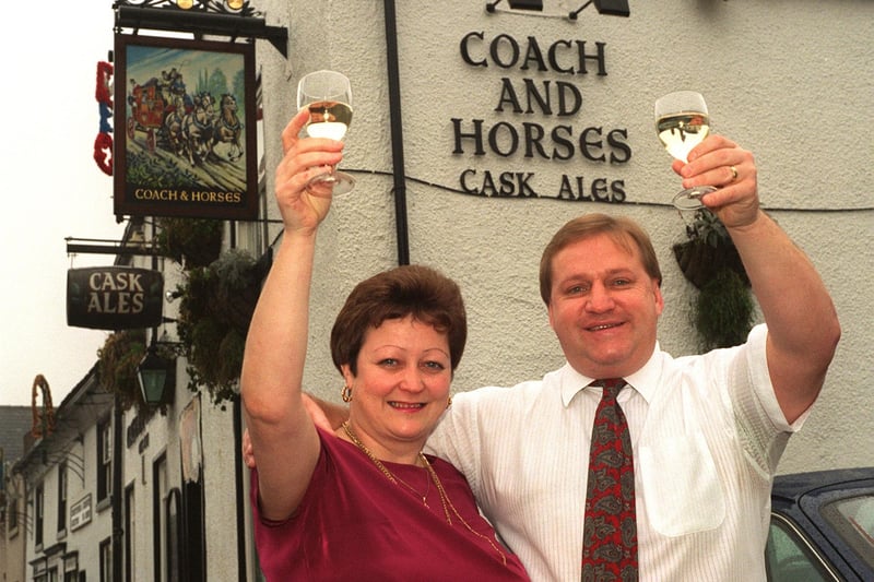 Coach and Horses pub licensee Val Goldthorpe and her husband Rob celebrate the watering hole on Commercial Street being nominated for Community Pub of the Year 97.