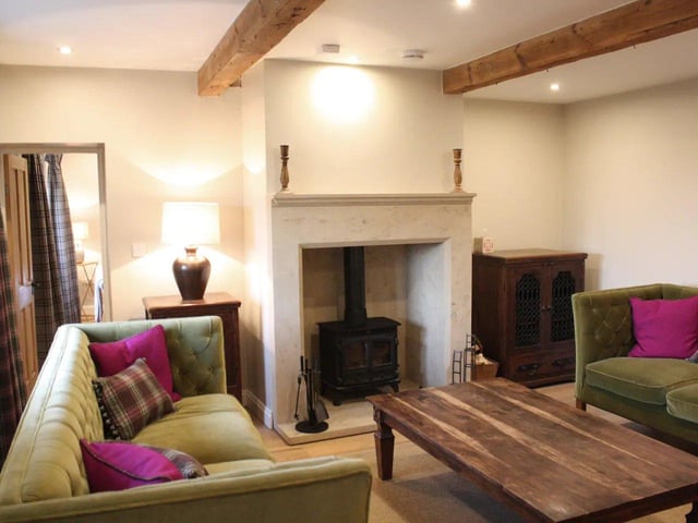 Underfloor heating downstairs and cast iron radiators upstairs ensure the cottage is always toasty warm, and the two log burning stoves act as a compelling way to add to the cosiness.