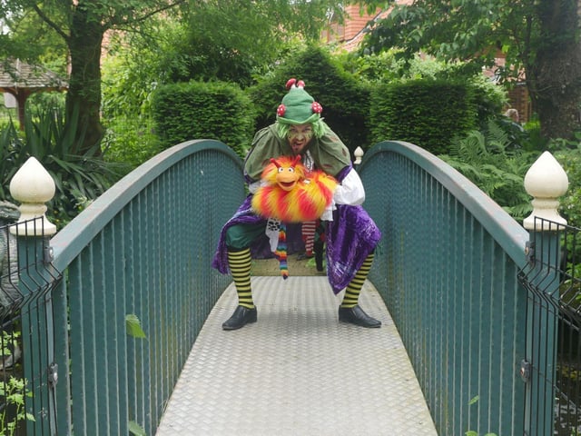 Tricky the Troblin with his puppet pal Chomper the Dragon await at the Enchanted Fairy Forest