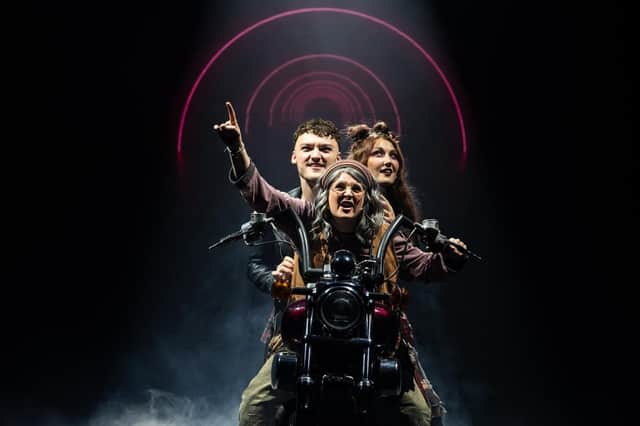 James Banks (Galileo); Meg Riley (Scaramouche) and Laura Hancock (Buddy) ride to the rescue.