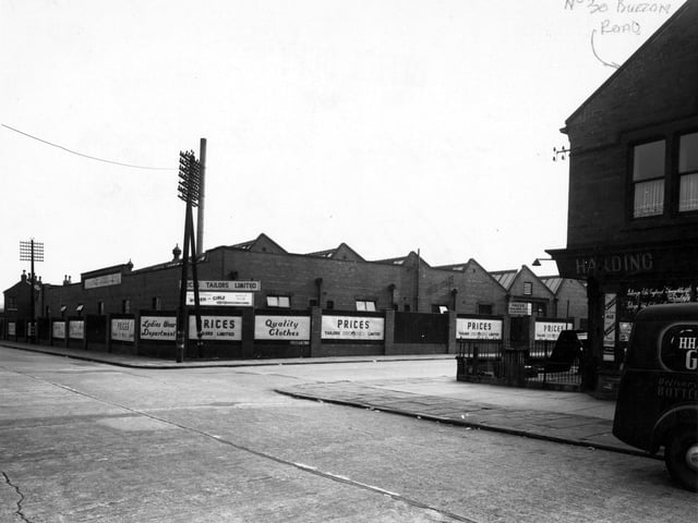 'Prices Tailors Ltd, wholesale clothiers' on the corner of Garnet Road and Burton Road in September 1949.