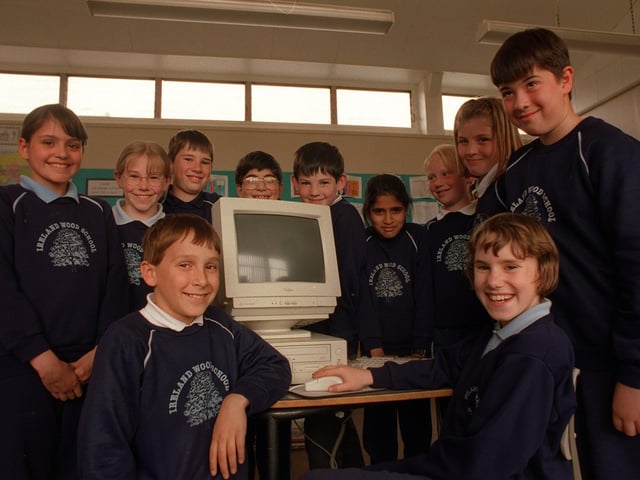 Some of the pupils from Ireland Wood Primary School with the new computer they had 'bought' by saving vouchers from ASDA. Pictured in May 1997.