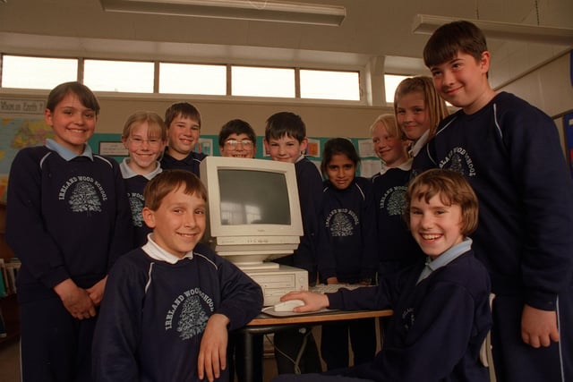 Some of the pupils from Ireland Wood Primary School with the new computer they had 'bought' by saving vouchers from ASDA. Pictured in May 1997.