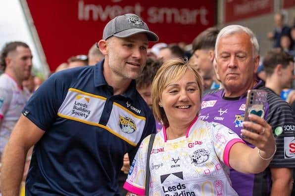 Coach Rohan Smith poses for a selfie with a fan following Rhinos' win at Salford. Picture by Olly Hassell/SWpix.com.