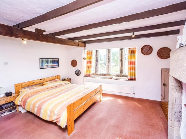 One of the four double bedrooms, with a garden view