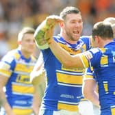 Brett Delaney and Danny McGuire celebrate Rhinos' Challenge Cup final win over v Castleford Tigers at Wembley in 2014. Picture by Steve Riding.