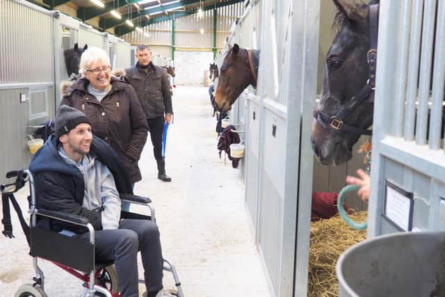 Former Leeds Rhino Rugby League player Rob Burrow meets three-year-old racehorse Burrow Seven, who was named after him to raise funds for the MND Association. Photo: Burrow Seven Racing Club / SWNS.