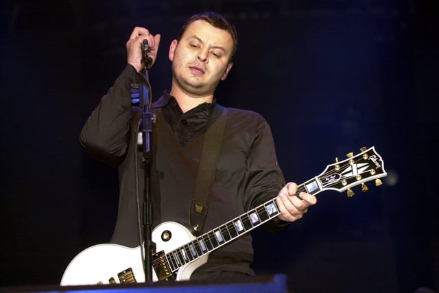 James Dean Bradfield of the Manic Street Preachers on stage at the Carling Leeds Festival in August 2001.