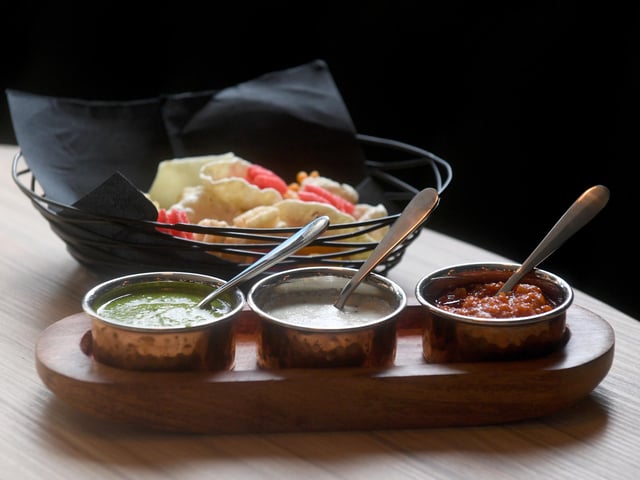 The poppadum basket with chutneys