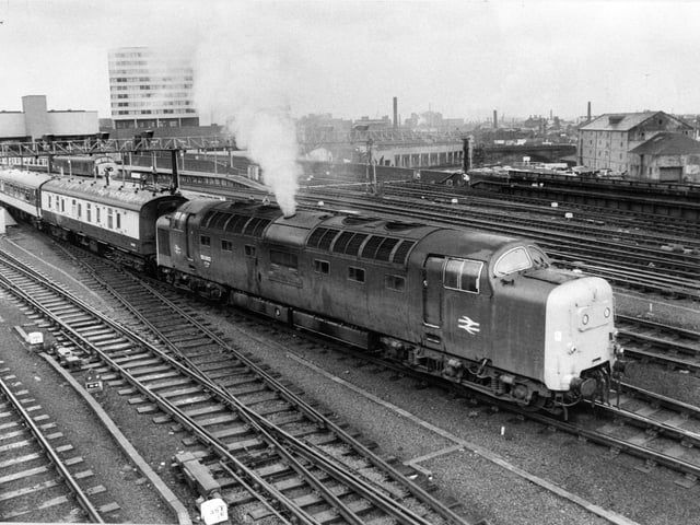Deltic Diesel 55002 King's Own Yorkshire Light Infantry, the last Yorkshire Pullman service from Leeds to London pulls slowly out of platform five at Leeds City Station.